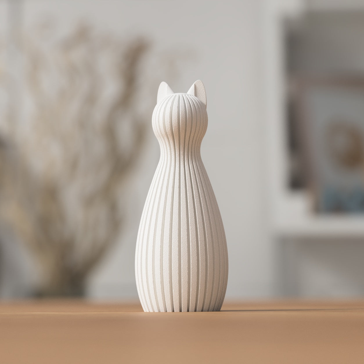 Freja kattestatue set fra siden